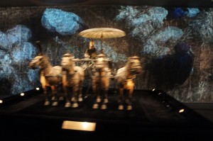 a group of statues on a display