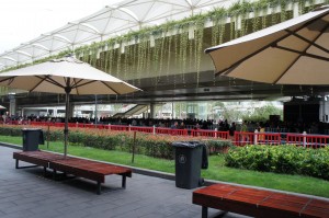 a group of benches under a covered walkway
