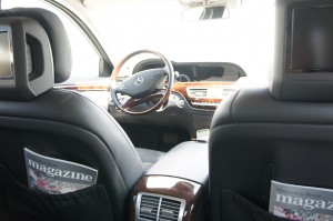 the interior of a car with a steering wheel