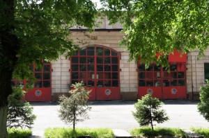 a fire station with red doors