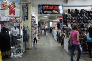 people in a store with many items