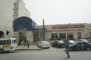 a building with cars parked in front of it