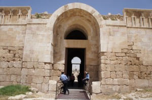 a stone building with arches
