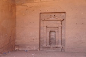 a stone wall with a doorway