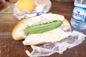 a sandwich with a pickle inside