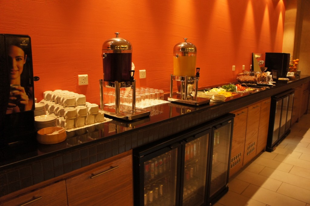 a buffet table with food and drinks