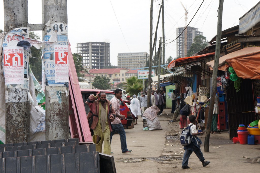 a group of people walking on a street