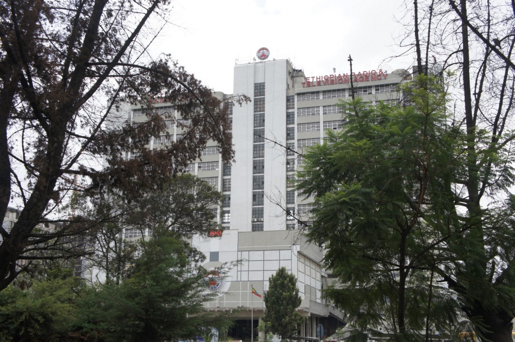 a building with trees around it