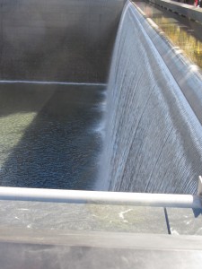 a water fall over a dam