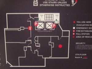a black and white sign with red symbols