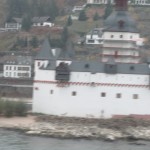 a white building with a red roof