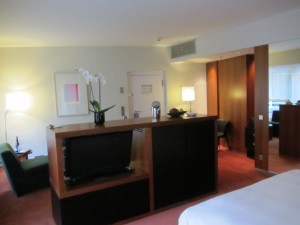 a room with a tv and a table