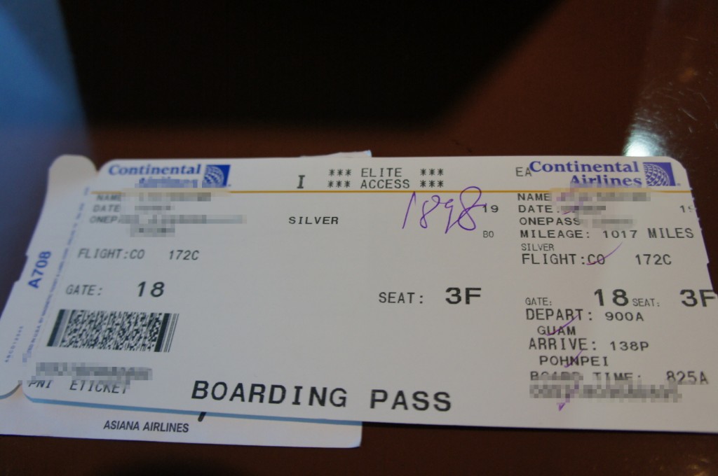 a close up of a boarding pass