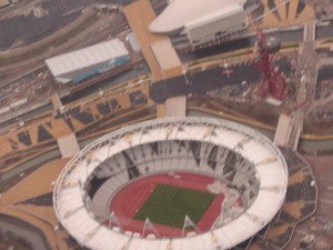 a stadium with a green field