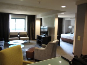 a room with a television and a bed