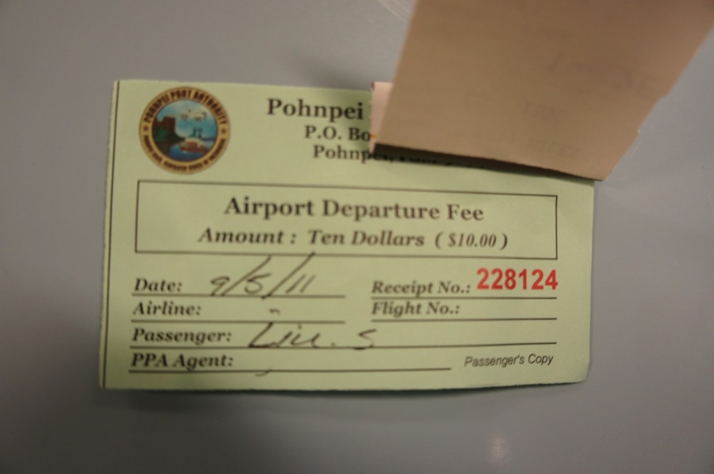 The image shows a receipt for an airport departure fee from Pohnpei Port Authority. The fee amount is ten dollars ($10.00). The receipt includes the following details:

- Date: 9/5/11
- Receipt No.: 228124
- Airline: (blank)
- Flight No.: (blank)
- Passenger: (illegible handwriting)
- PPA Agent: (blank)

The receipt is labeled as the "Passenger's Copy" and has a logo of the Pohnpei Port Authority in the top left corner.