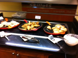 a group of pans of food on a counter