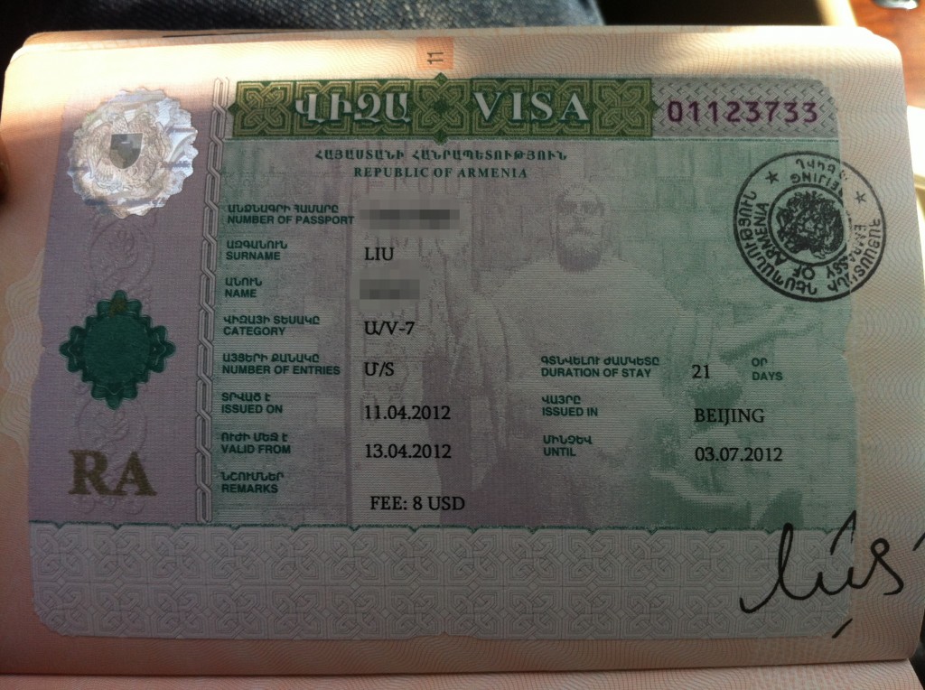 The image shows an Armenian visa. The visa includes various details such as the passport number, surname, name, visa category, number of entries, date of issue, validity period, duration of stay, place of issue, and expiration date. There is also a fee mentioned, a signature, and a stamp. The visa is issued to a person with the surname "LIU" and is valid for 21 days. The visa was issued in Beijing on 11.04.2012 and is valid until 03.07.2012. The fee for the visa is 8 USD.