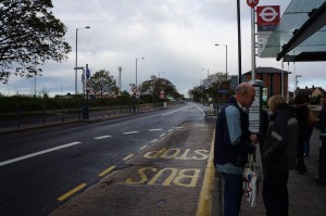 a group of people standing on a street
