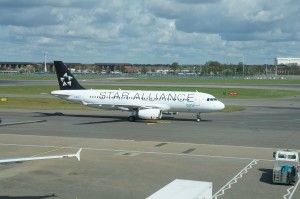 a white airplane on a runway