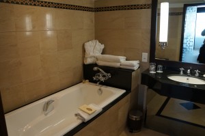 a bathroom with a bathtub and sink