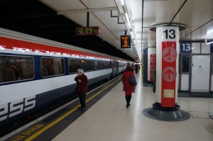 people walking on a train platform