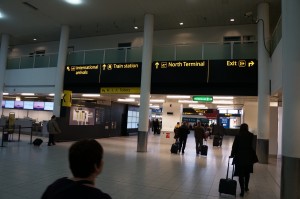people in an airport with luggage