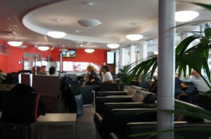 a group of people sitting in a waiting room