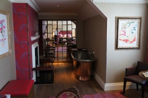 a room with a fireplace and a tub