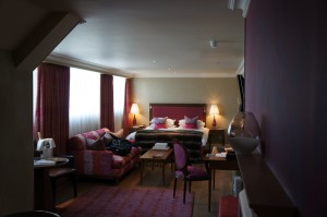 a room with a bed and a table