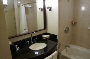 a bathroom with a mirror and sink