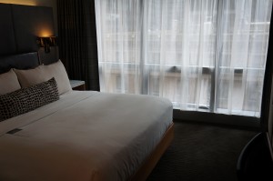 a bed with white sheets