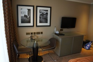 a room with a table and chairs