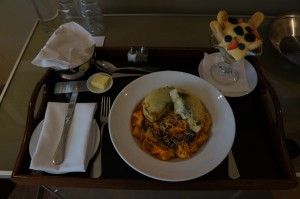 a plate of food on a tray