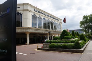 a building with a flag on the roof