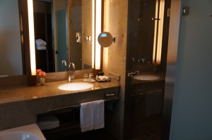 a bathroom with a mirror and sink