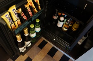 a mini fridge full of drinks