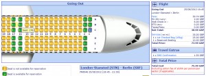 a white airplane with yellow and green buttons