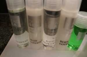 a group of bottles of shampoo and body lotion