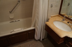a bathroom with a bathtub and sink