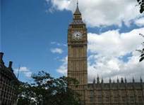 a clock tower with a blue sky