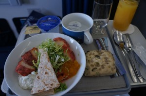 a plate of food on a tray
