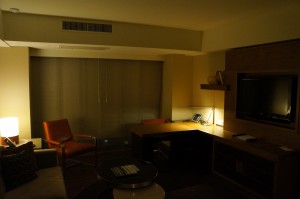a room with a tv and a chair
