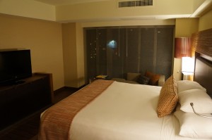 a bed in a hotel room