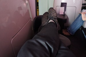 a person's legs in a chair