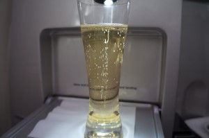 a glass of beer on a tray
