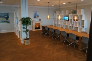 long room with a long table and chairs