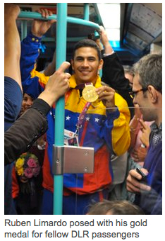 a man holding a medal