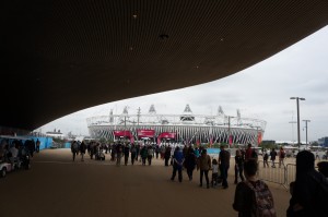 a group of people walking in a tunnel