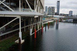 a water next to a building